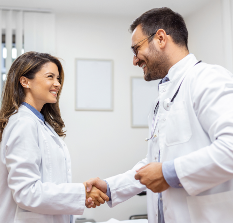 Medical staff shaking hands.