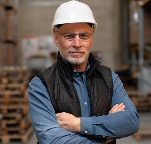 adult man with worker helmet